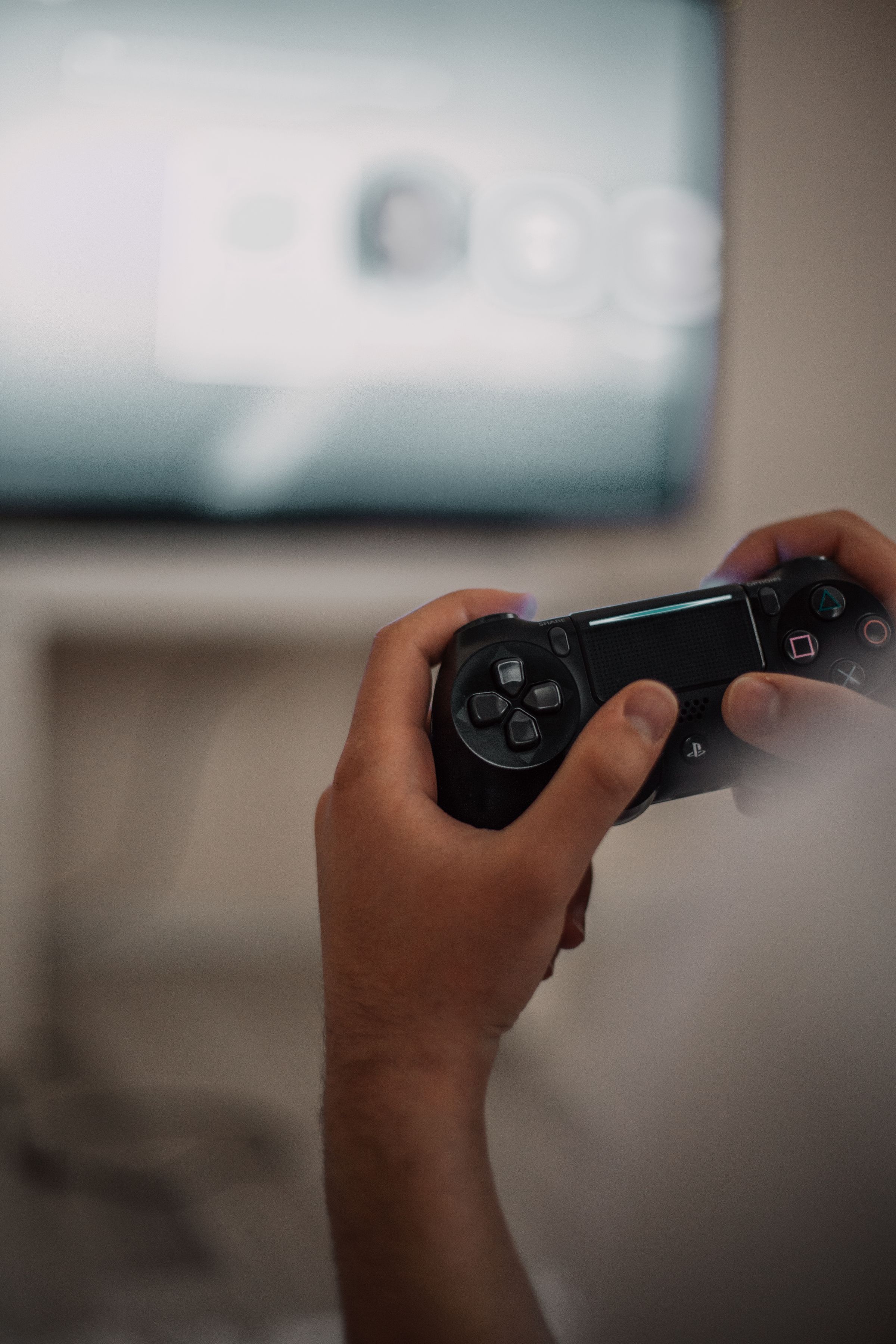 Hands holding a controller, illustrating the Sample Game Controller